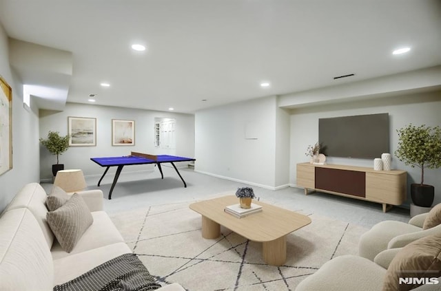 rec room with baseboards, light colored carpet, and recessed lighting