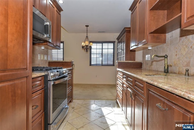 kitchen featuring a sink, open shelves, stainless steel appliances, light colored carpet, and a chandelier