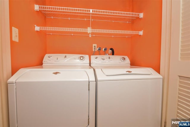 laundry area featuring laundry area and washer and clothes dryer