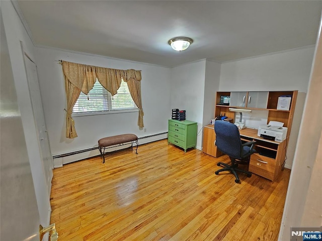 office space with light wood-style flooring and baseboard heating