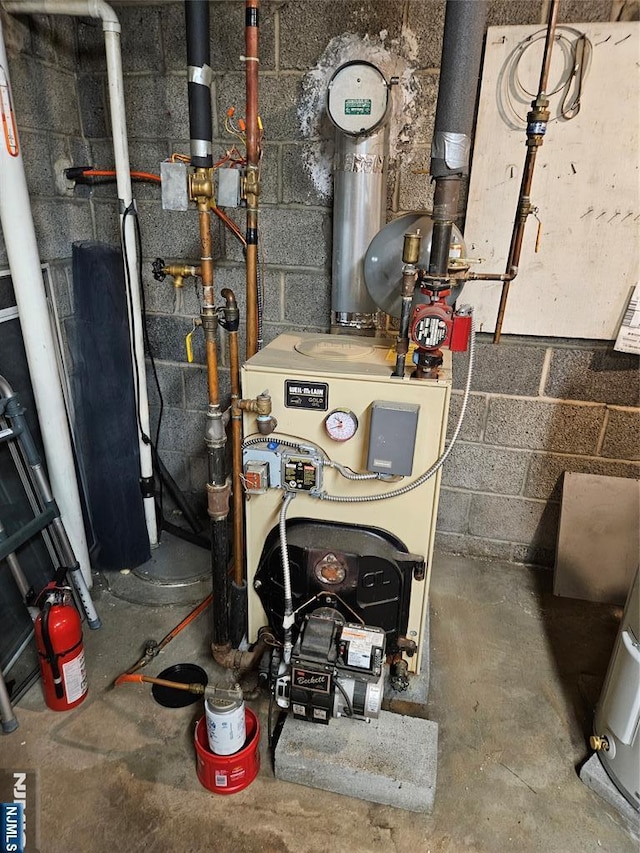 utility room featuring a heating unit