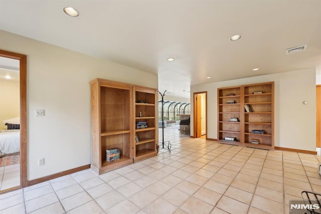 unfurnished room featuring light tile patterned floors, visible vents, recessed lighting, and baseboards