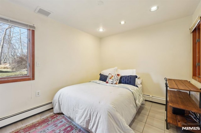 bedroom featuring light tile patterned floors, baseboard heating, recessed lighting, and visible vents