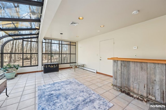 sunroom / solarium with visible vents and a healthy amount of sunlight