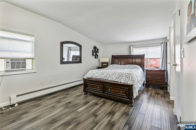 bedroom with lofted ceiling, cooling unit, a baseboard heating unit, and wood finished floors