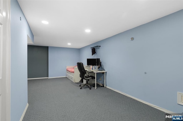 unfurnished office featuring recessed lighting, carpet, and baseboards