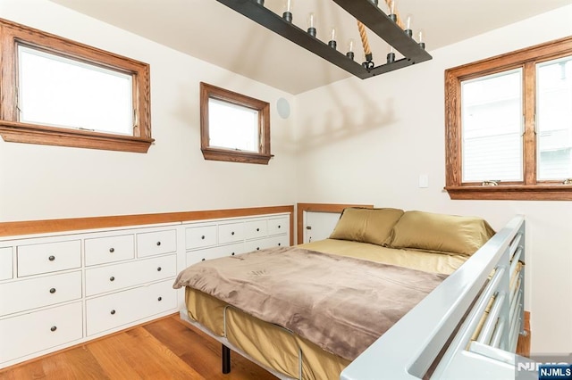 bedroom featuring light wood-style floors