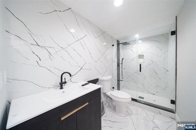 bathroom with marble finish floor, stone wall, and a marble finish shower