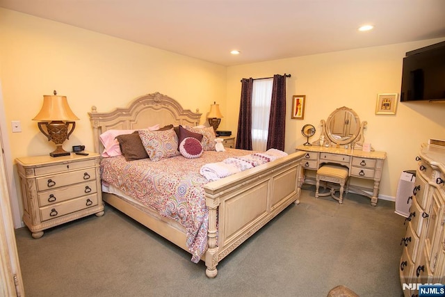 bedroom featuring recessed lighting and dark carpet