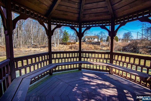 wooden terrace with a gazebo