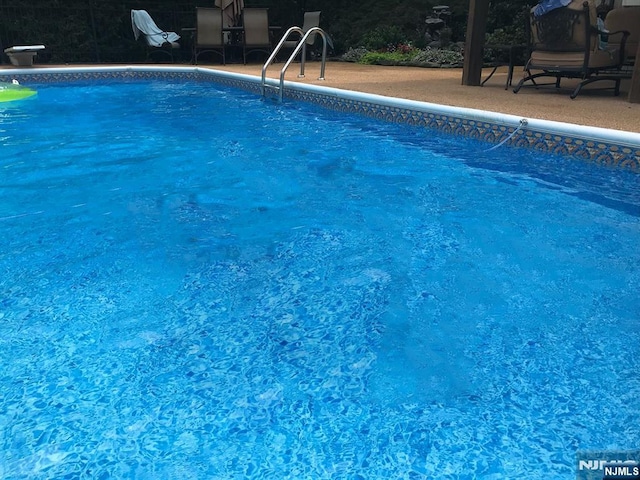 pool featuring a patio