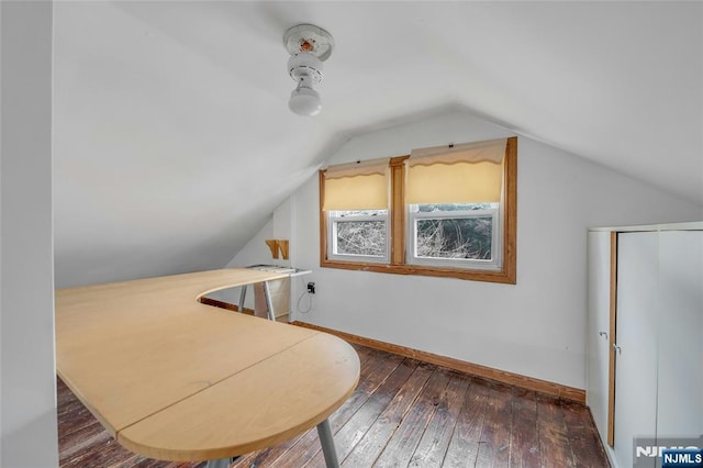 bonus room with lofted ceiling, baseboards, and hardwood / wood-style flooring