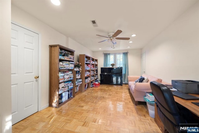 office space with a ceiling fan, recessed lighting, and visible vents