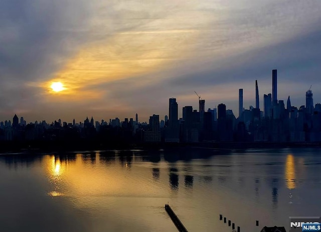 property's view of city featuring a water view