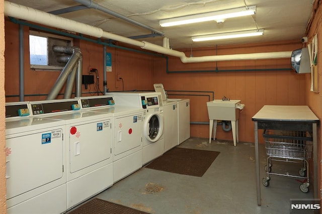 common laundry area featuring washing machine and dryer