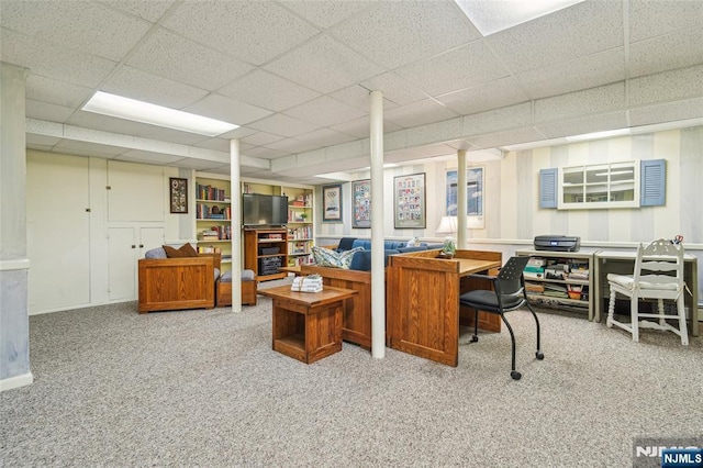 office space with a drop ceiling and carpet floors