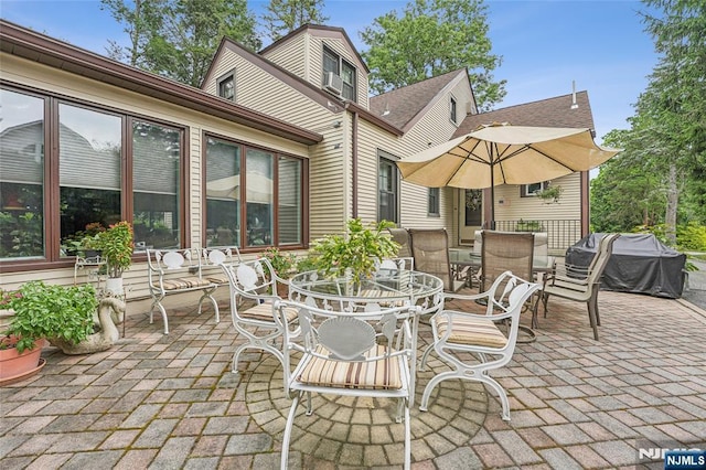 view of patio / terrace featuring grilling area and outdoor dining area