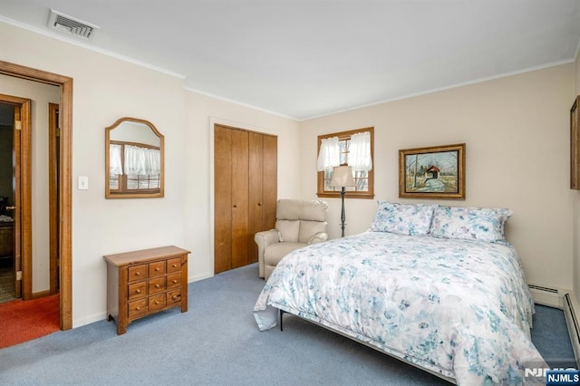 bedroom with baseboards, visible vents, crown molding, carpet floors, and a closet