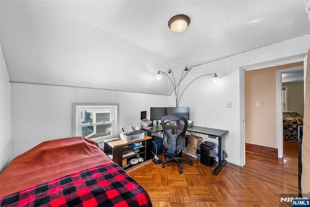 bedroom with lofted ceiling