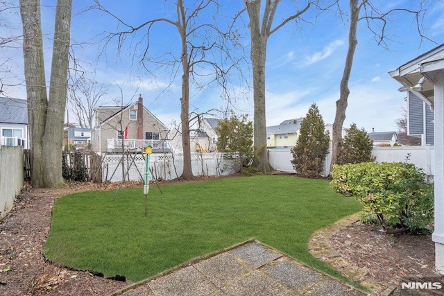 view of yard featuring a fenced backyard