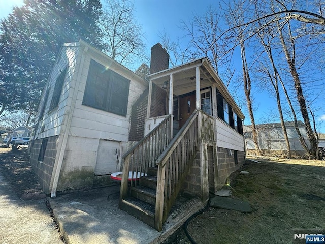 view of front of property with a chimney