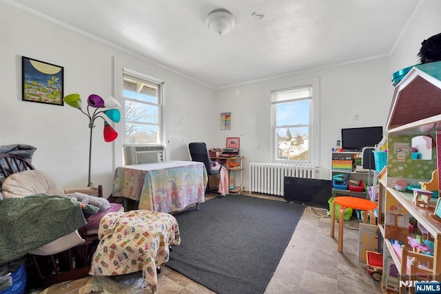 bedroom with radiator heating unit, ornamental molding, and cooling unit