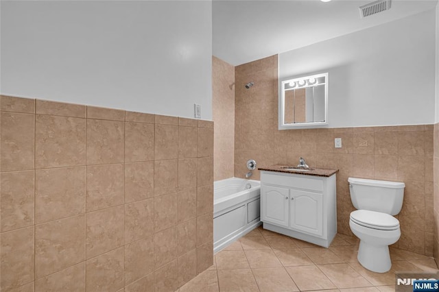 bathroom with visible vents, a shower, toilet, a tub, and tile walls