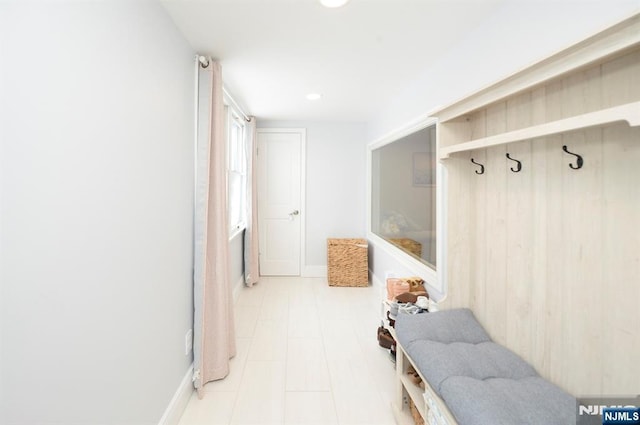 mudroom featuring recessed lighting