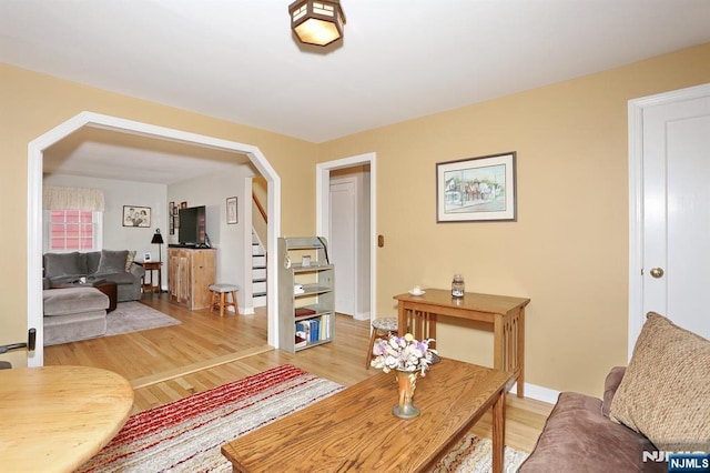 office space featuring light wood-type flooring and baseboards