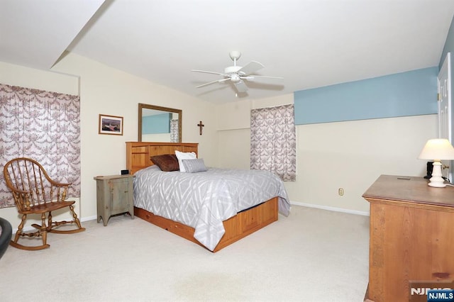 bedroom with carpet flooring, a ceiling fan, and baseboards