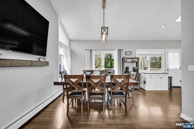 dining space featuring a baseboard radiator, baseboards, dark wood-style flooring, and recessed lighting