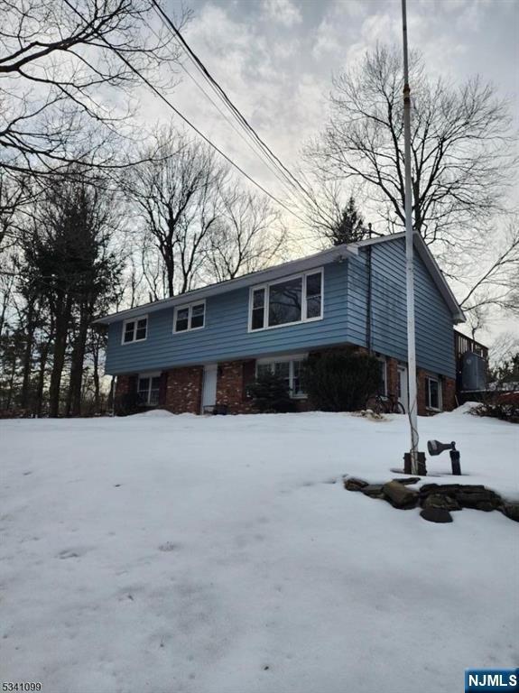 view of front of property with brick siding