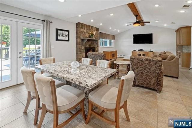 dining room with a fireplace, recessed lighting, lofted ceiling with beams, baseboard heating, and a ceiling fan