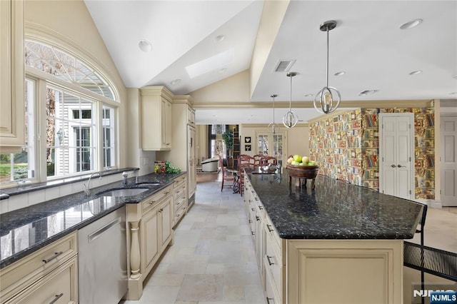 85 Buckhaven Hl, Upper Saddle River, NJ 07458 - kitchen with cream cabinets, vaulted ceiling, a sink, a center island, and hanging light fixtures