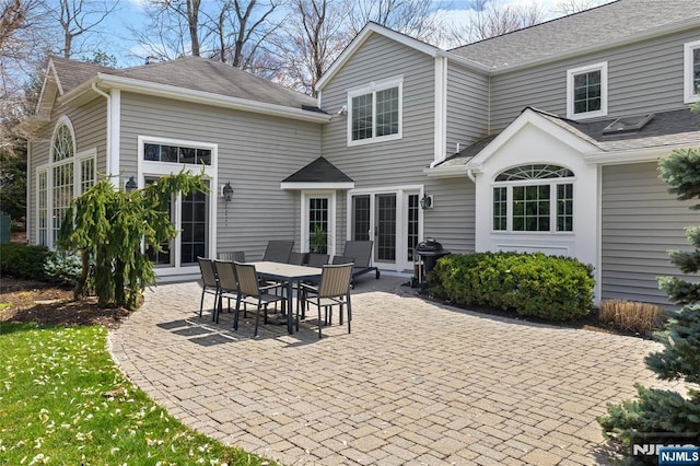 85 Buckhaven Hl, Upper Saddle River, NJ 07458 - rear view of house featuring a patio and a shingled roof