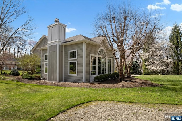 85 Buckhaven Hl, Upper Saddle River, NJ 07458 - view of property exterior featuring a chimney and a lawn