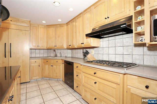 kitchen with light tile patterned floors, black dishwasher, under cabinet range hood, light brown cabinets, and stainless steel gas cooktop