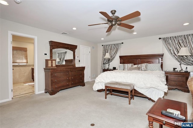 bedroom featuring light colored carpet, visible vents, and recessed lighting