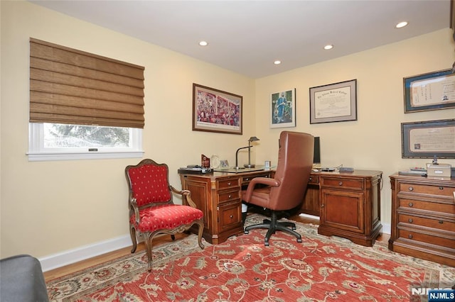 home office featuring recessed lighting, wood finished floors, and baseboards