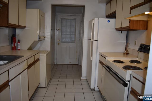 kitchen with light tile patterned floors, light countertops, white electric range oven, and under cabinet range hood