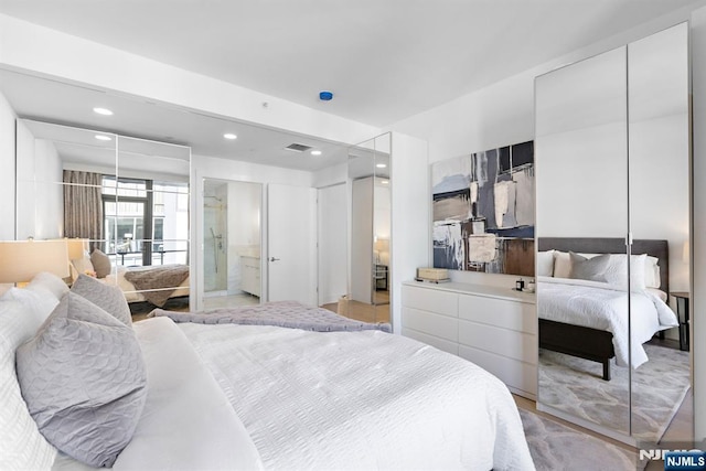 bedroom featuring visible vents and recessed lighting