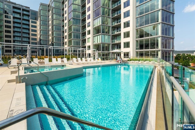 pool with a patio