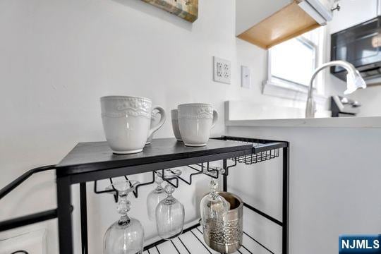 interior details featuring a sink