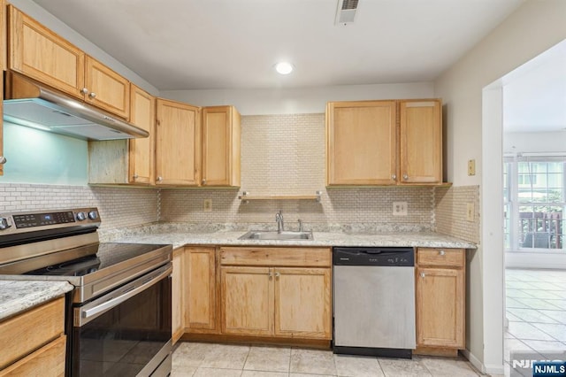 kitchen featuring stainless steel appliances, visible vents, light brown cabinets, a sink, and under cabinet range hood