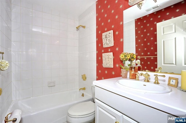 bathroom with toilet, wallpapered walls, bathtub / shower combination, and visible vents