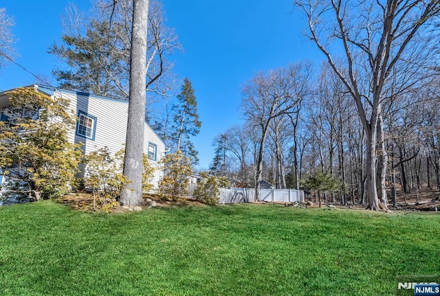 view of yard featuring fence