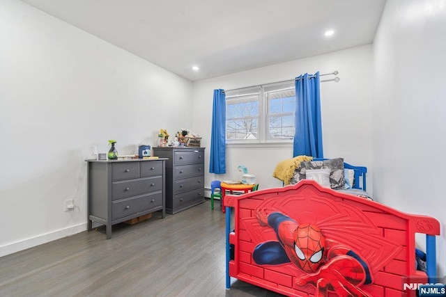 bedroom featuring recessed lighting, baseboards, and wood finished floors