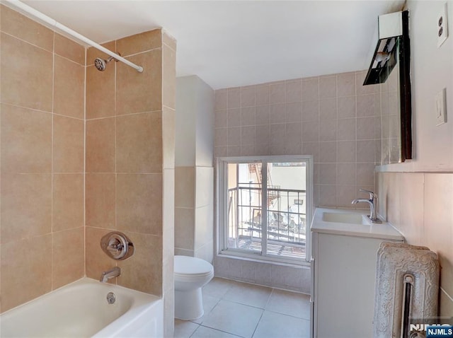 5 Elm St, Newark, NJ 07102 - bathroom featuring toilet, tile walls, tile patterned flooring,  shower combination, and vanity