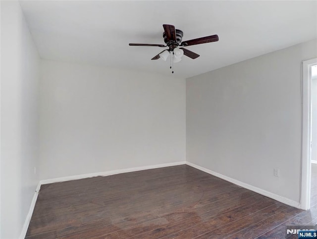 5 Elm St, Newark, NJ 07102 - unfurnished room featuring dark wood finished floors, ceiling fan, and baseboards