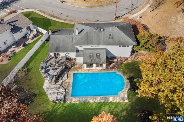 view of swimming pool featuring a fenced in pool and a patio